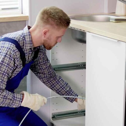 Plumber fixing Blocked Drains