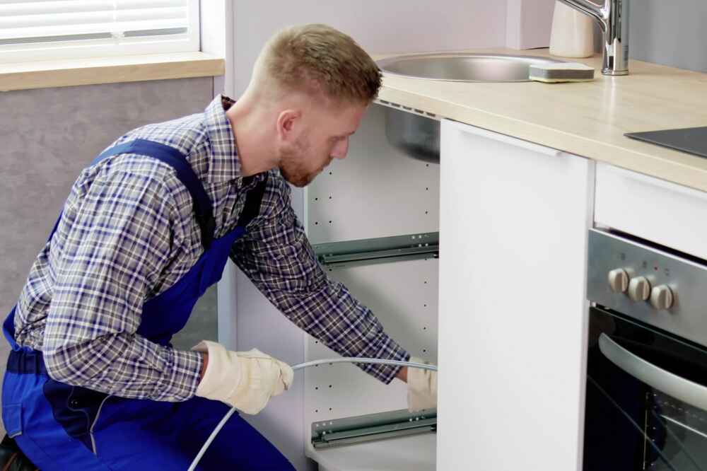 Plumber fixing Blocked Drains